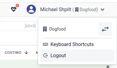 The profile menu open at the top-right, showing the organization name and account options